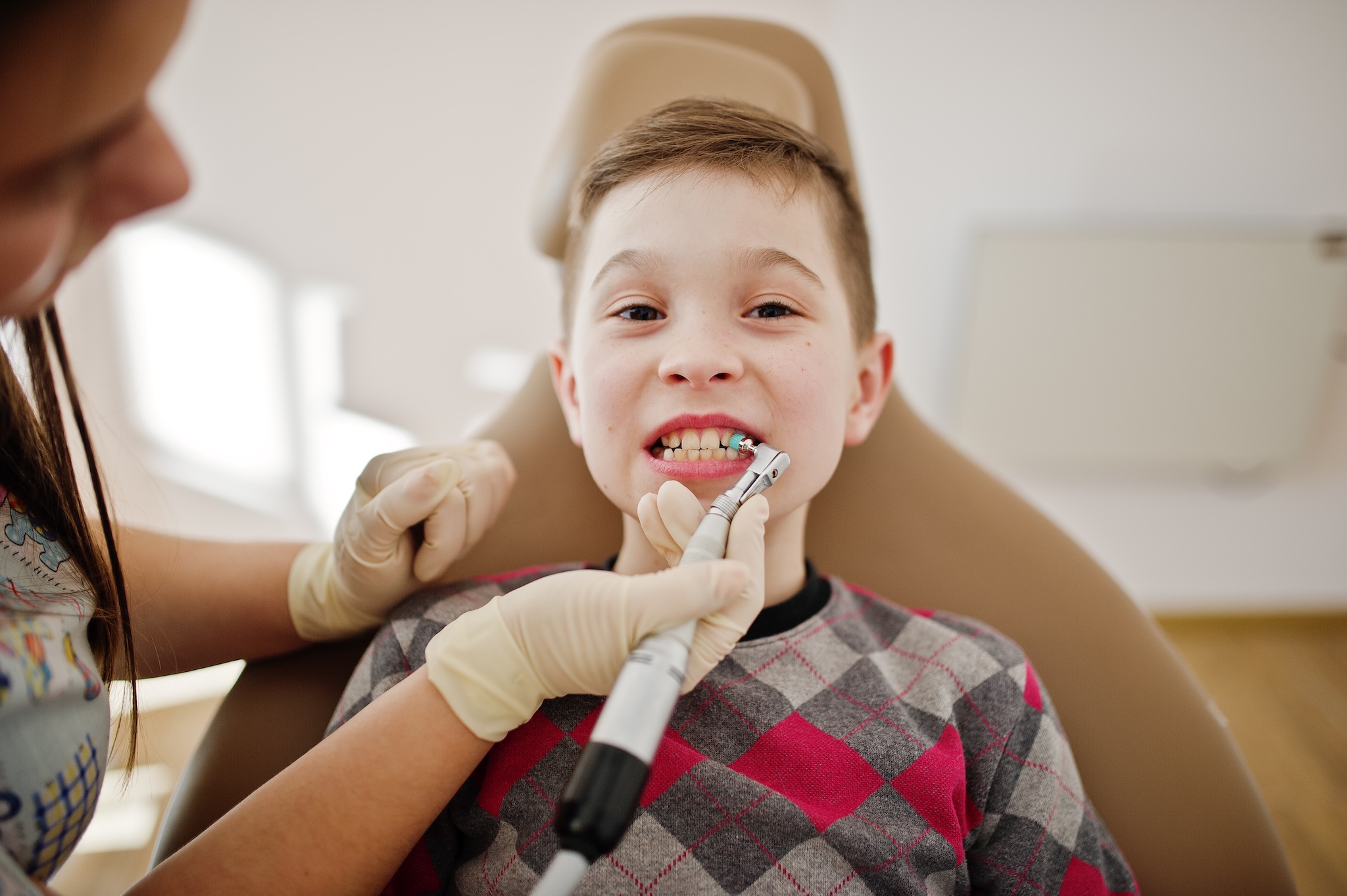 Little boy at dentist chair. Children dental.